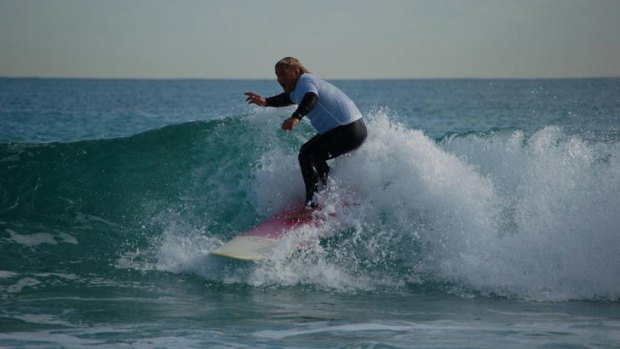 Go Surf owner Paul Lofthouse had to cancel lessons when sharks were sighted in the area