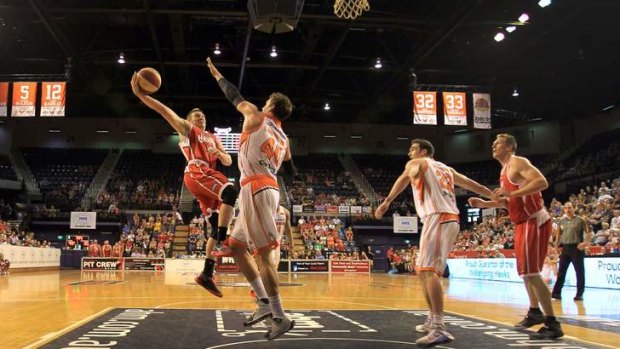 Wollongong Hawks import Rotnei Clarke was guarded heavily by the Cairns Taipans.