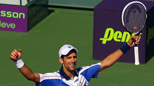 Novak Djokovic celebrates after defeating Rafael Nadal.