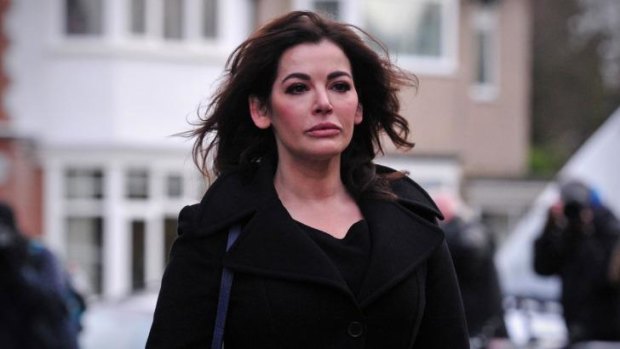 Defending her brand ... British television chef Nigella Lawson arrives at Isleworth Crown Court in west London.