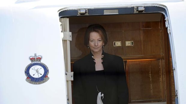 In mourning ... Julia Gillard arriving at Adelaide Airport yesterday.