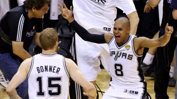 Patrick Mills celebrates Spurs' NBA championship.