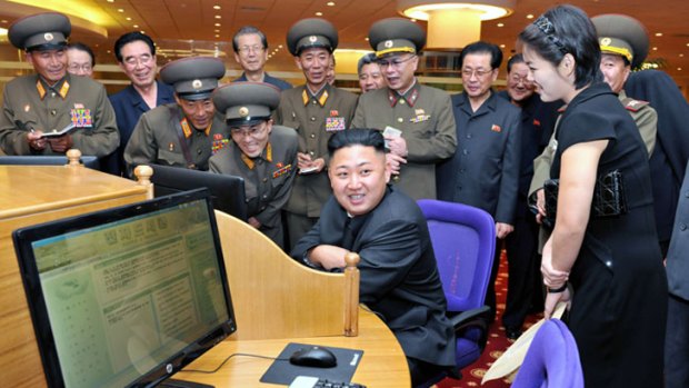 North Korea's Supreme Leader Kim Jong Un, at a computer - possibly tweeting.