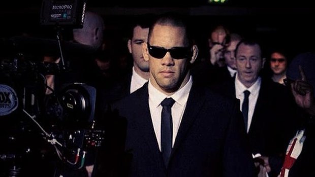 James Te Huna channels some Men In Black as he enters Wembley Stadium for his UFC light heavyweight bout against Canadian Ryan Jimmo.