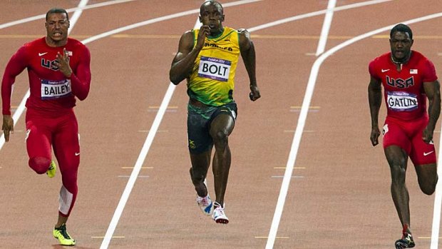 Usain Bolt powers to victory in the 100m.