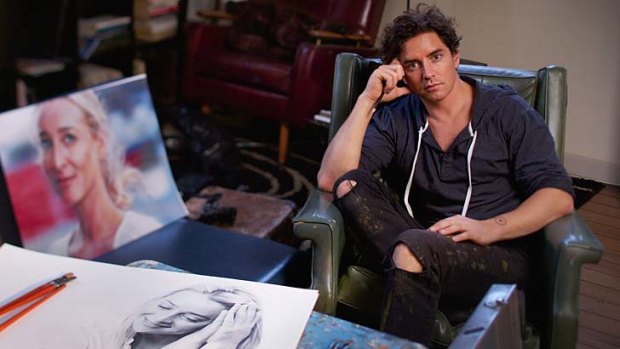 Brush with fame: Vincent Fantauzzo in his studio, with works depicting partner Asher Keddie.
