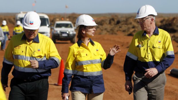 Julia Gillard at Barrow Island with Chevron Australia's Roy Krzywosinski and Colin Beckett.