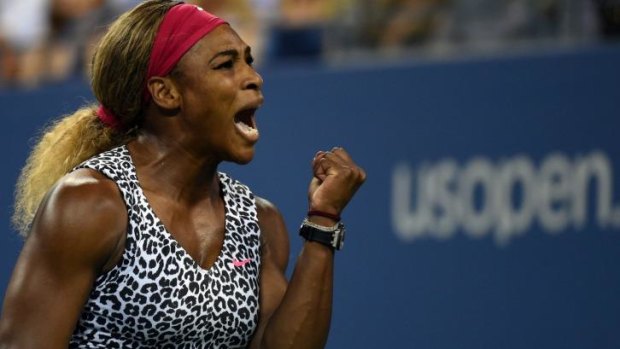 Serena Williams of the US celebrates the first set point against Flavia Pennetta of Italy.