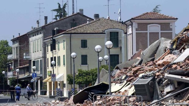 Second hit ... collapsed buildings in Cavezzo, Italy, after the second earthquake struck.
