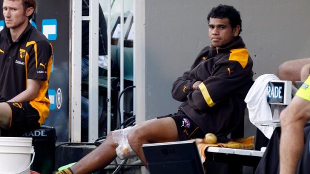 Cyril Rioli with a suspected hamstring injury during round five last season.