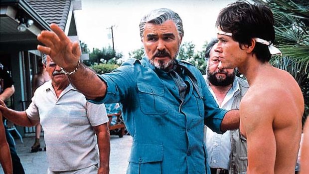 Burt Reynolds and Mark Wahlberg in Boogie Nights.