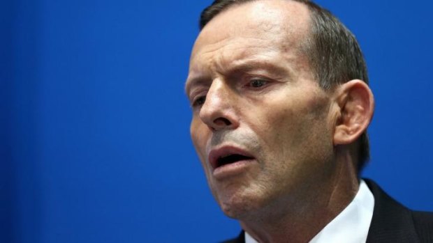 Change of tone: Tony Abbott speaks to the media in Canberra.