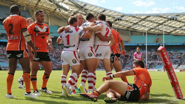 Strong finish: Gerard Beale of the Dragons celebrates his try against the Wests Tigers at ANZ Stadium.