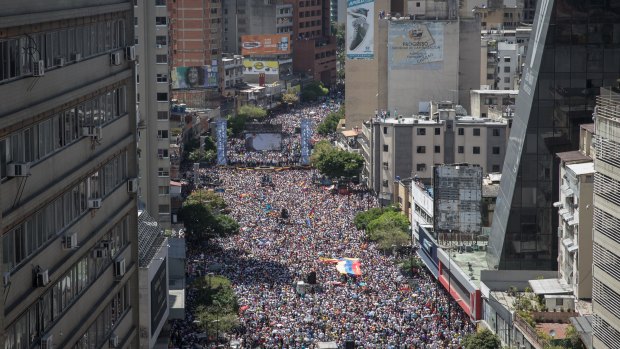 Roger Waters has views on Venezuela too. Opposition supporters attending a rally against Nicolas Maduro.