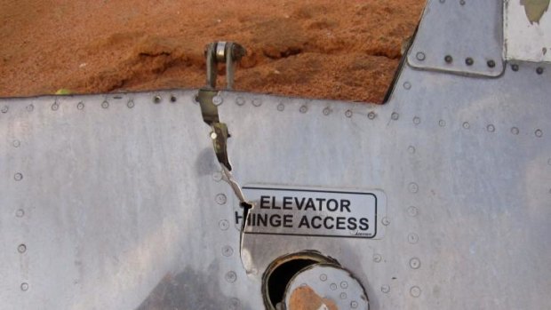 A part of the the McDonnell Douglas MD-83 at the crash site, in Mali. French soldiers secured a black box from the Air Algerie wreckage site in a desolate region of restive northern Mali on Friday