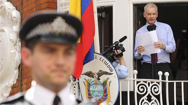 "End the witch-hunt" ... WikiLeaks founder Julian Assange makes a statement from the balcony of the Ecuador embassy in London.