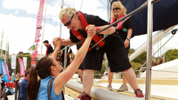 Julia Maguire welcomes her mum Jo Martin, who arrived into Sydney on board Team Garmin as part of the Clipper round the world yacht race on Saturday.