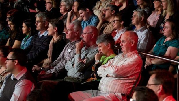 Negative body language ... Not everyone in the Q&A audience was convinced by Treasurer Joe Hockey's answers as he clarified information about the Federal Budget.