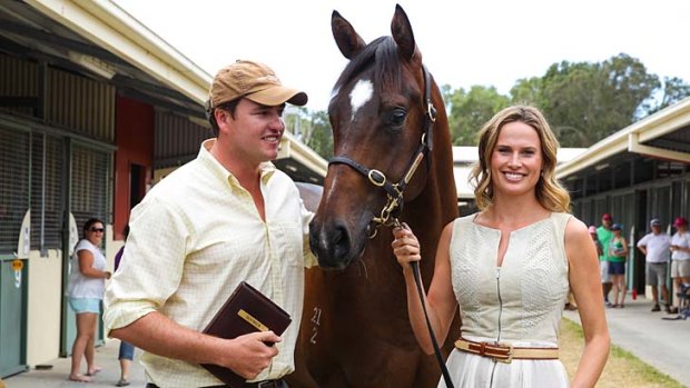 Francesca Cumani meets one of the equine stars at the 2014 Jeep Magic Millions Yearling Sales Opening at the Gold Coast Turf Club on the Gold Coast.