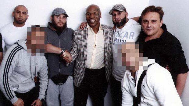 From left: Sam Hamden (white T-shirt) former Comancheros bikie, Khaled Sharrouf, previously convicted and jailed in relation to a terror plot, Mike Tyson Former world champion boxer and convicted rapist, Bilal Fatrouni previously convicted and jailed in relation to steroid and gun charges, and George Alex executive with labour hire firm Active Force.