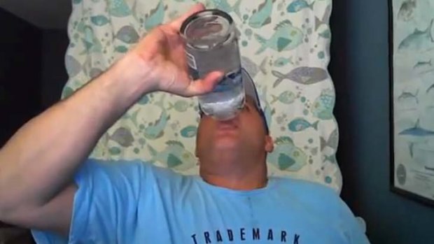 This man removes the plastic seal on a one-litre bottle of vodka and drinks its entire contents in less than 15 seconds.