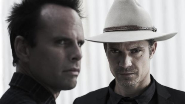 Bound together: The relationship between Boyd Crowder and Raylan Givens is central to <i>Justified</i>.