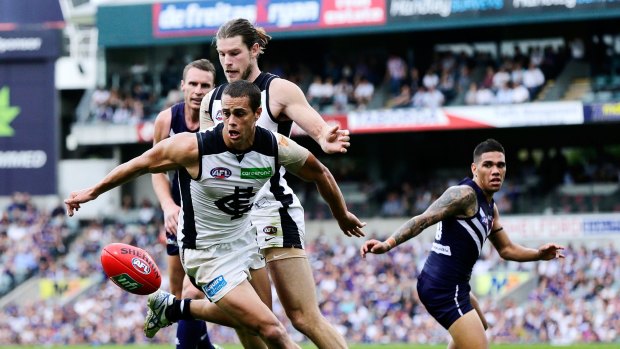 Shock win: Carlton's  Ed Curnow attacks the ball against Fremantle in Perth. 