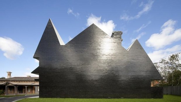 Pop art: The glazed black, brick silhouette of the Penleigh and Essendon Grammar Junior Boys School.