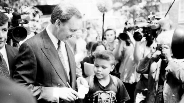 Former Australian Prime Minister, Paul Keating, signs an autograph after delivering an emotional speech in Redfern, Sydney, to mark the International Year of the World's Indigenous People in 1992.