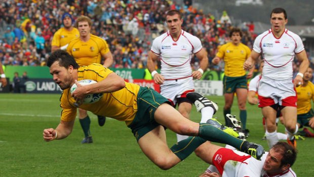 Adam Ashley-Cooper scores the Wallabies seventh try after a Quade Cooper grubber.
