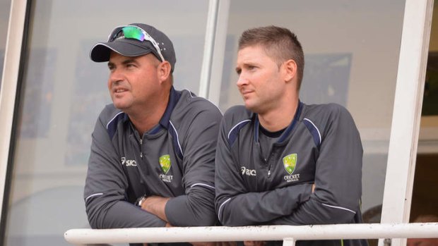 Grim viewing: Australia coach Mickey Arthur and captain Michael Clarke look on.
