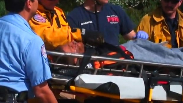 Rescued: the man spent up to six days trapped between two rocks.
