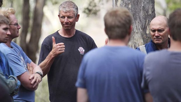 Thumbs up: a caver thanks his rescuer.