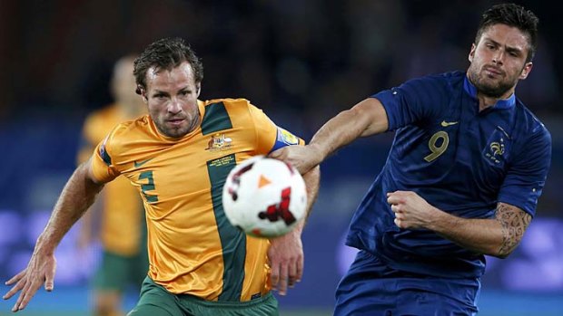 Lucas Neill's future will be decided for him by the next Socceroos coach.