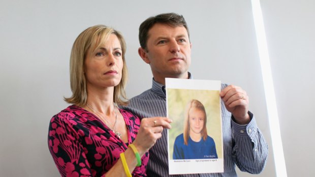 Kate and Gerry McCann hold an age-progressed police image of their daughter during a news conference to mark the 5th anniversary of the disappearance of Madeleine McCann, on May 2, 2012.