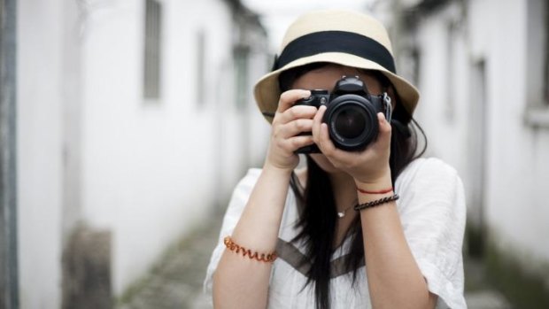 Say cheese: Taking photos may interfere with your memory of special events.