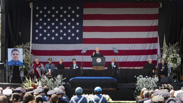 'We refuse to bend': US Vice President Joe Biden speaks during a memorial service for fallen MIT police officer Sean Collier.