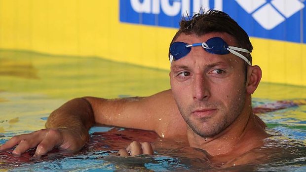 A pensive Ian Thorpe takes a break from training at the Singapore Sports School yesterday.