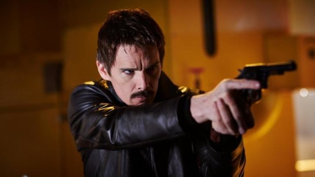 Ethan Hawke plays an agent who can jump around in time in the thriller <i>Predestination.</i>