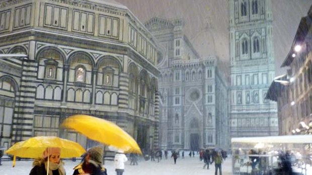 A rare sight ... heavy snowfalls blanket Florence in Italy.