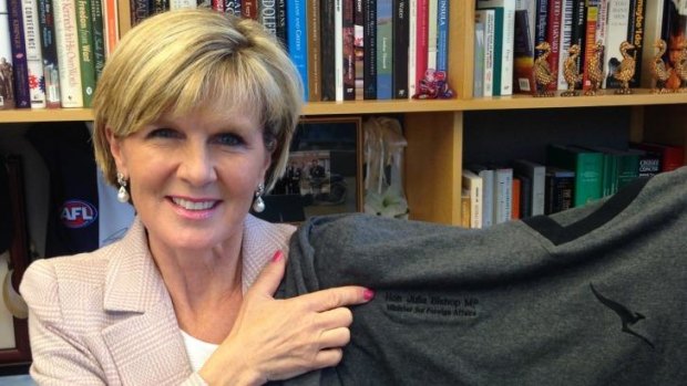 Personal PJs: Julie Bishop shows off her monogrammed Qantas pyjamas.