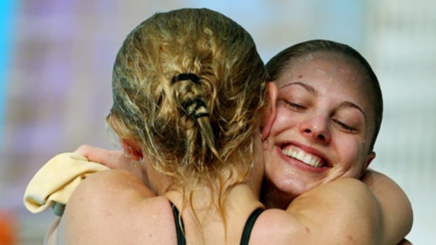 Sharleen Stratton is congratulated by teammate Jaele Patrick on her gold medal win.