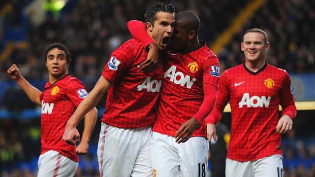 United's Robin van Persie celebrates scoring against Arsenal.