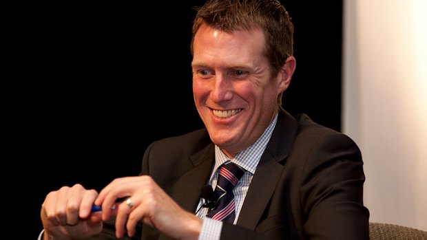 WA Treasurer Christian Porter...looking so happy you'd swear he had found a chicken drumstick.