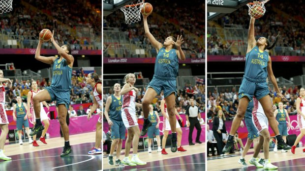 One, two, three ... Liz Cambage unleashes a slam dunk against Russia.