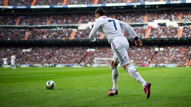 World at his feet ... Cristiano Ronaldo.