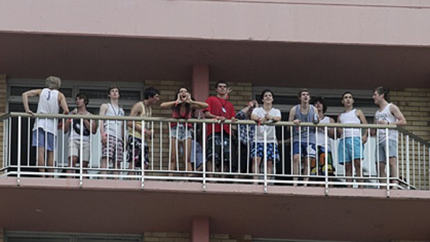 Schoolies crowd a balcony at a Gold Coast hotel on the first day of the end-of-school celebrations on Saturday.