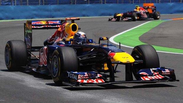 Sebastian Vettel leads from Mark Webber during the race.