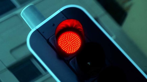 A Gold Coast trial will allow motorists to turn left at a red light at some intersections.