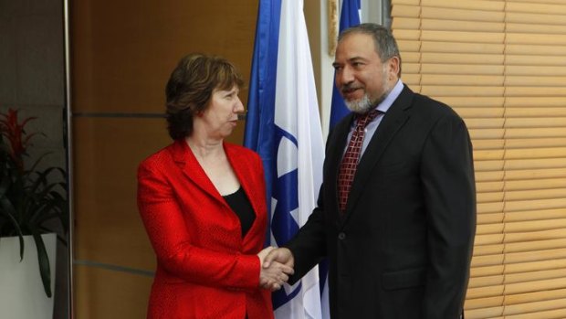 Israel's Foreign Minister Avigdor Lieberman shakes hands with European Union's Foreign Policy Chief Catherine Ashton before their meeting in Jerusalem.